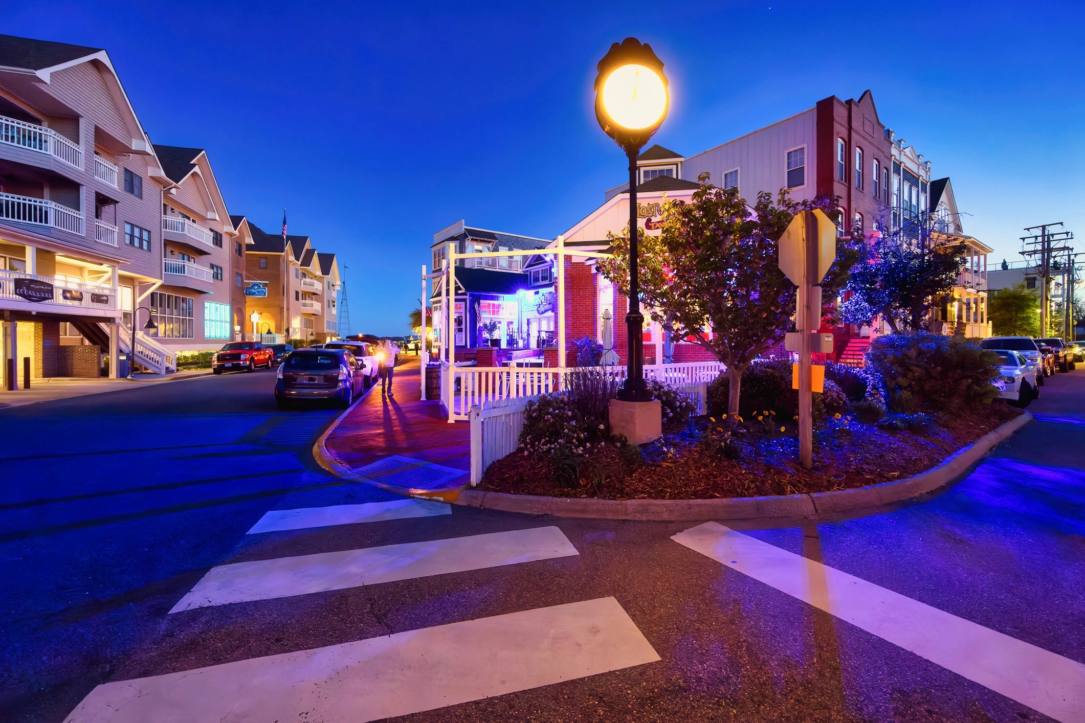 Warm small-town storefront with inviting lights