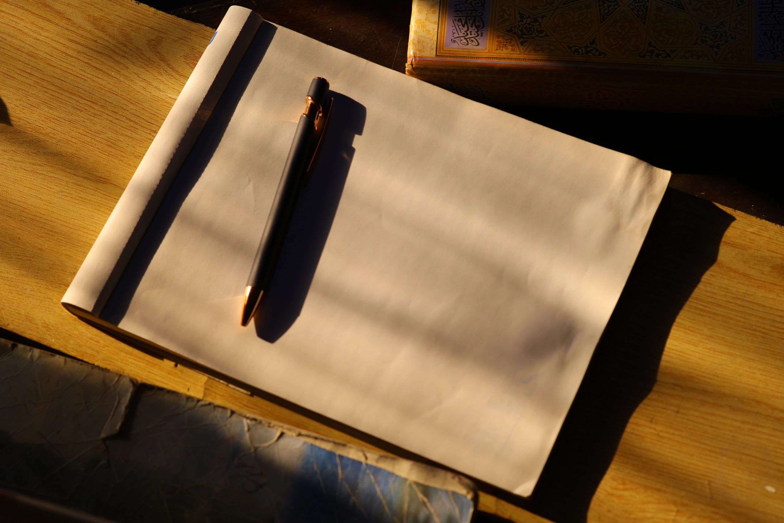 Notebook and pens on a creative desk