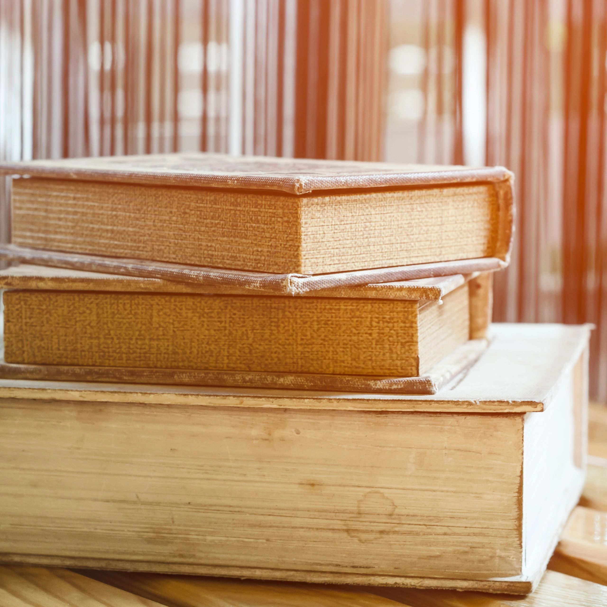 Stack of vintage books on a table